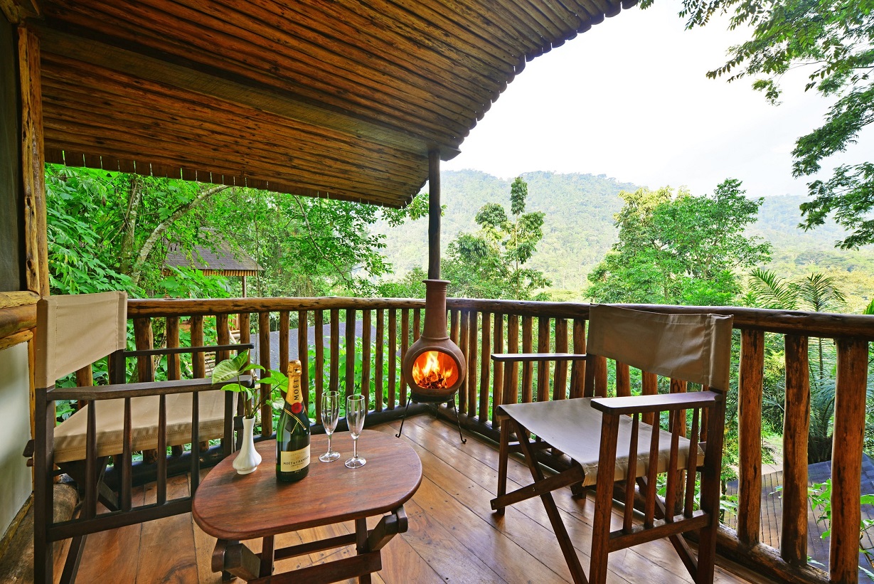 Buhoma-Lodge-balcony-fireplace Buhoma Lodge balcony with fireplace and bottle of bubbly